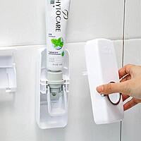 TOOTH PASTE DISPENSER WITH STORAGE FOR TOOTH BRUSHES TOOTH PASTE DISPENSER WITH STORAGE FOR TOOTH BRUSHES